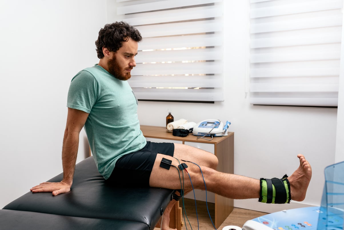 Patient Receiving Electrotherapy in clinic.